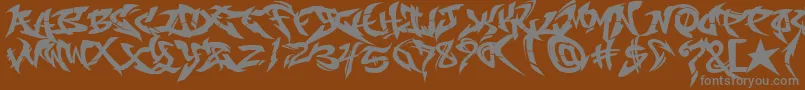 RaseoneFill Font – Gray Fonts on Brown Background