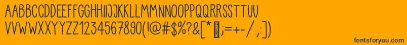 Kiddo Handwriting-fontti – mustat fontit oranssilla taustalla