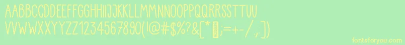 Kiddo Handwriting Font – Yellow Fonts on Green Background