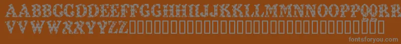 Шрифт Kiddy Flakey – серые шрифты на коричневом фоне