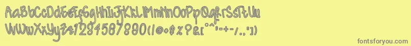 Kidosplay Outline Font – Gray Fonts on Yellow Background