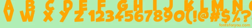 フォントKids Magazine – オレンジの文字が緑の背景にあります。
