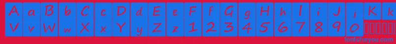 Czcionka kidsboardgamefont – niebieskie czcionki na czerwonym tle