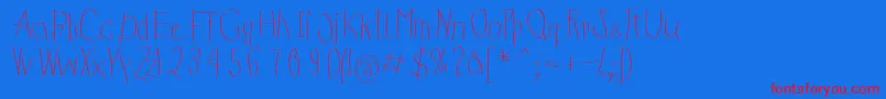 KidsFirstPrintFont Font – Red Fonts on Blue Background