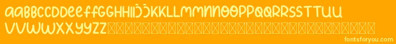 KidsPlanet Font – Yellow Fonts on Orange Background