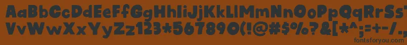 kidsrock DEMO Font – Black Fonts on Brown Background