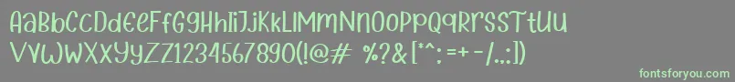 Kidstar-fontti – vihreät fontit harmaalla taustalla