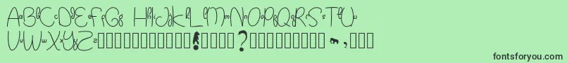 Kidtoy Font – Black Fonts on Green Background