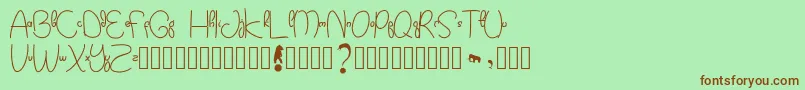 Kidtoy Font – Brown Fonts on Green Background