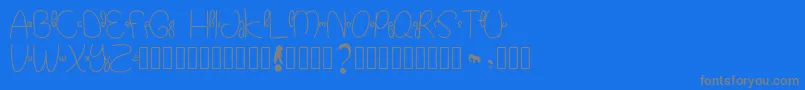 Kidtoy Font – Gray Fonts on Blue Background