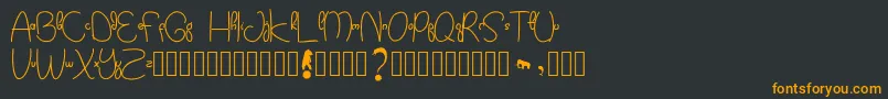 Kidtoy Font – Orange Fonts on Black Background