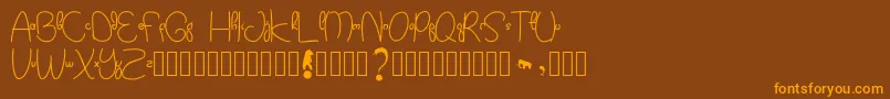 Kidtoy Font – Orange Fonts on Brown Background