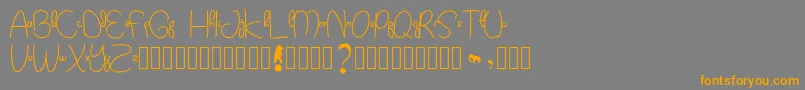 Kidtoy Font – Orange Fonts on Gray Background