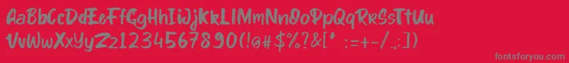 フォントkinder Boy font – 赤い背景に灰色の文字