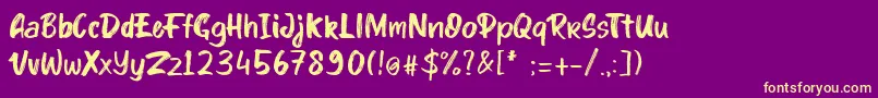 Fonte kinder Boy font – fontes amarelas em um fundo roxo