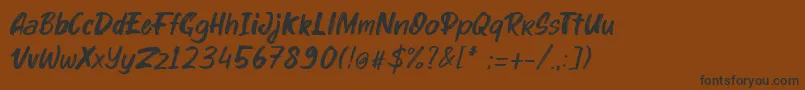 Fonte kinder Boy Italic – fontes pretas em um fundo marrom