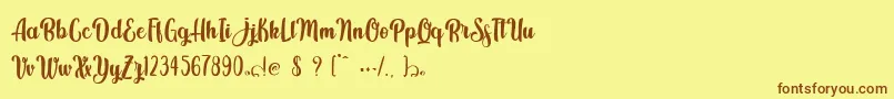 Weitere Informationen zur Kindly Jasmine-Schriftart Kindly Jasmine-Schriftart – Braune Schriften auf gelbem Hintergrund