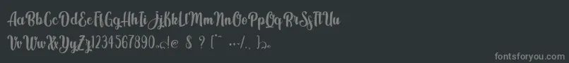 Шрифт Kindly Jasmine – серые шрифты на чёрном фоне