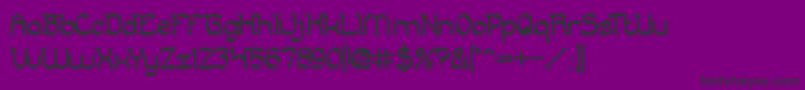フォントKing And Queen – 紫の背景に黒い文字