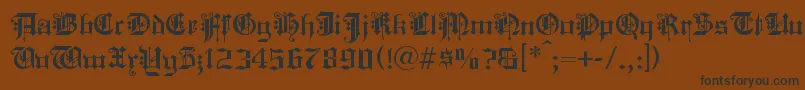 フォントKINGC    – 黒い文字が茶色の背景にあります