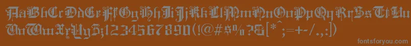 フォントKINGC    – 茶色の背景に灰色の文字