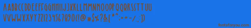 Kinglet Cute Font – Brown Fonts on Blue Background