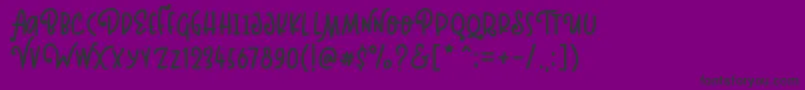 Kinglet Playful-fontti – mustat fontit violetilla taustalla