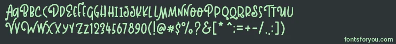 フォントKinglet Playful – 黒い背景に緑の文字