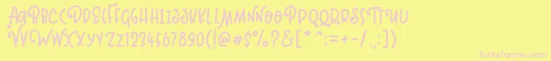 Fonte Kinglet Playful – fontes rosa em um fundo amarelo