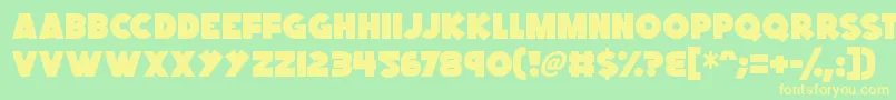 フォントKings Feast – 黄色の文字が緑の背景にあります