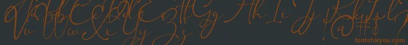 Kingsley Font – Brown Fonts on Black Background