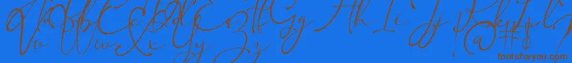Kingsley Font – Brown Fonts on Blue Background