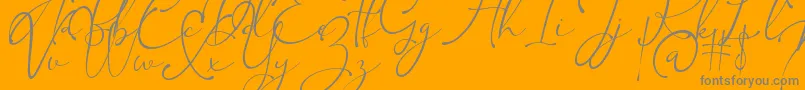 Kingsley-Schriftart – Graue Schriften auf orangefarbenem Hintergrund