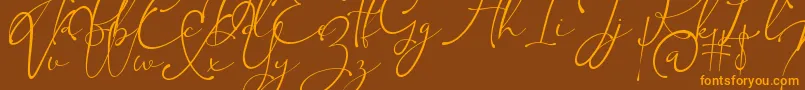 Kingsley-Schriftart – Orangefarbene Schriften auf braunem Hintergrund