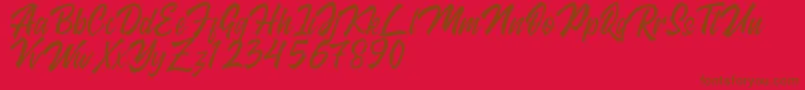 Kingstand demo-Schriftart – Braune Schriften auf rotem Hintergrund