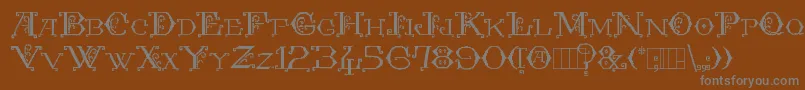 Kingthings Embroidery Font – Gray Fonts on Brown Background