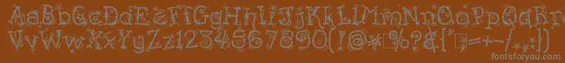 Kingthings Flashbang Font – Gray Fonts on Brown Background