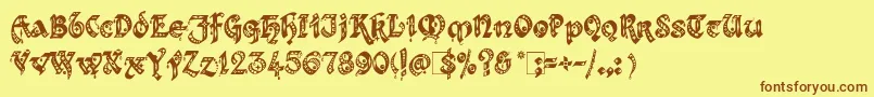 Kingthings Gothique Font – Brown Fonts on Yellow Background