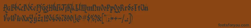 Kingthings Italique Font – Black Fonts on Brown Background
