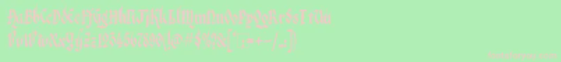 Kingthings Italique Font – Pink Fonts on Green Background