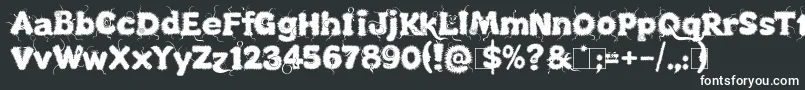 Шрифт Kingthings Lupineless – белые шрифты на чёрном фоне