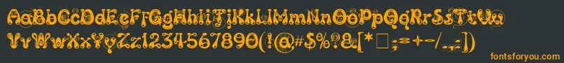 Kingthings Slipperylip Font – Orange Fonts on Black Background