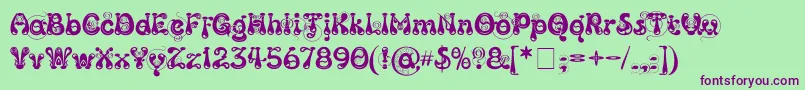 Kingthings Slipperylip Font – Purple Fonts on Green Background