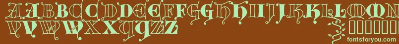 フォントKingthings Versalis – 緑色の文字が茶色の背景にあります。