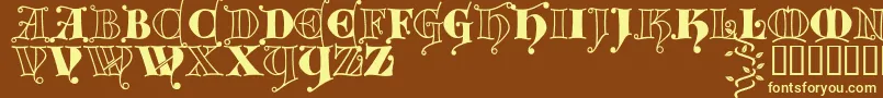 Kingthings Versalis-fontti – keltaiset fontit ruskealla taustalla