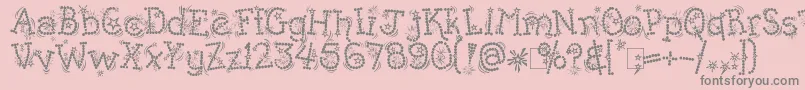 Fonte Kingthings Whizzbang – fontes cinzas em um fundo rosa