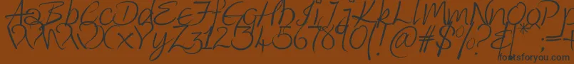 フォントKingthings Wrote – 黒い文字が茶色の背景にあります