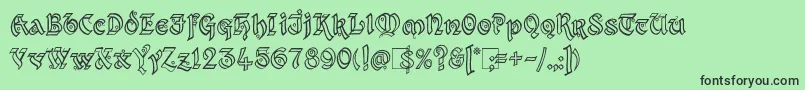 フォントKingthings Xander Outline – 緑の背景に黒い文字