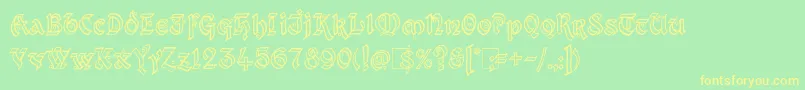 Kingthings Xander Outline-fontti – keltaiset fontit vihreällä taustalla