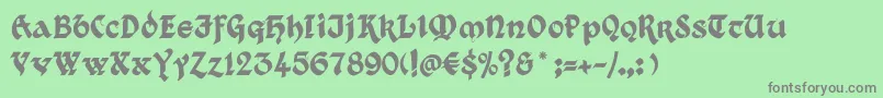 フォントKingthings Xander – 緑の背景に灰色の文字